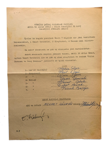 Typed document signed 'Mehmet Güleryüz and E. Kalmik'