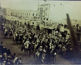 Historically significant sepia photograph showing 300 armed Arab cavalry arriving from the vicinity of Tripoli, entering the parade on 10 July [1911, or 1912]